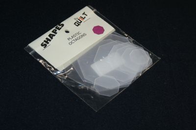 A PACKET OF PLASTIC OCTOGONS